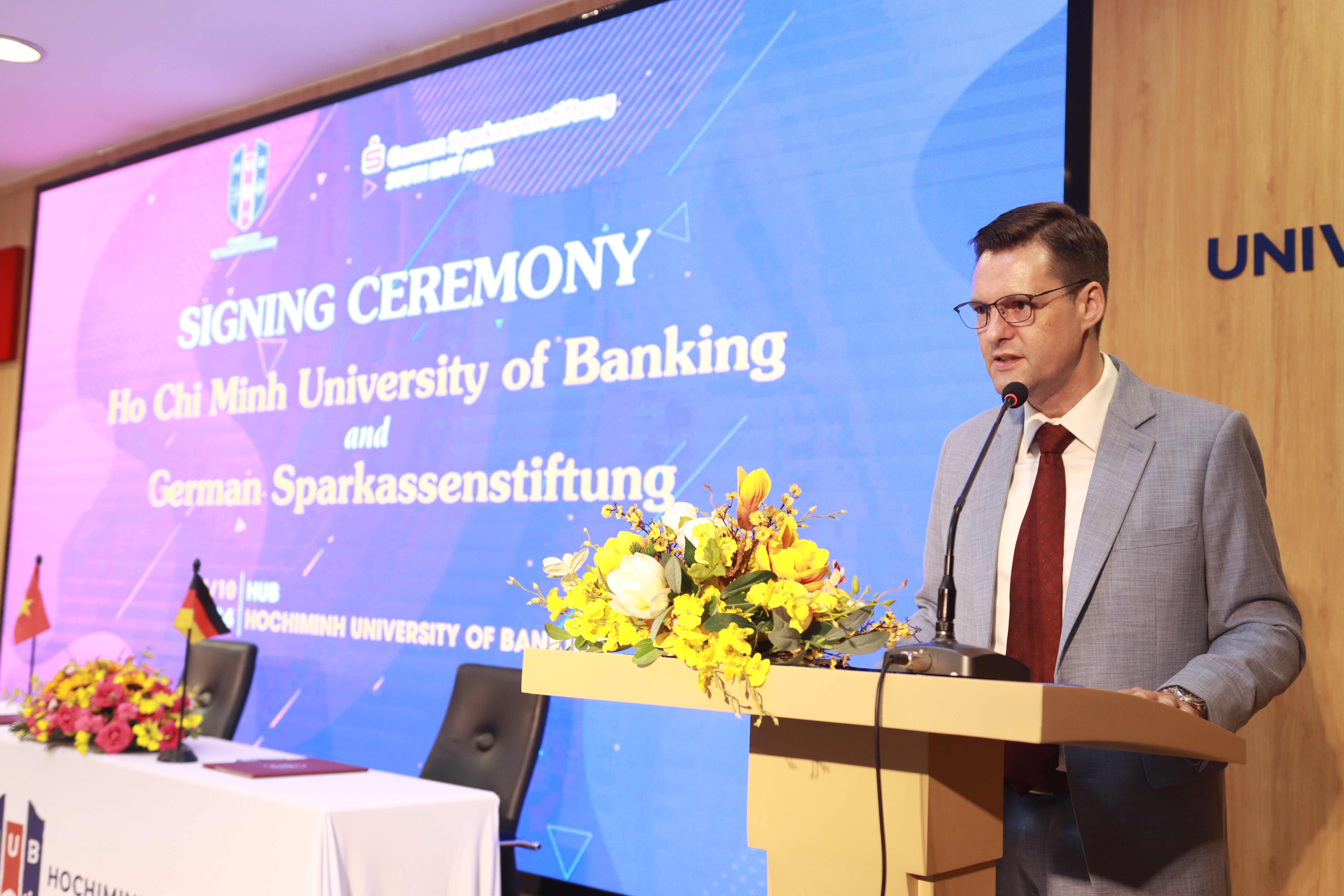 Mr. Christian Grajek represents DSIK giving a speech in the ceremony